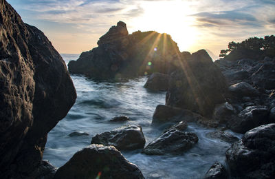 Scenic view of sea against sky during sunset