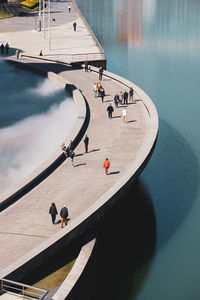 High angle view of people by swimming pool