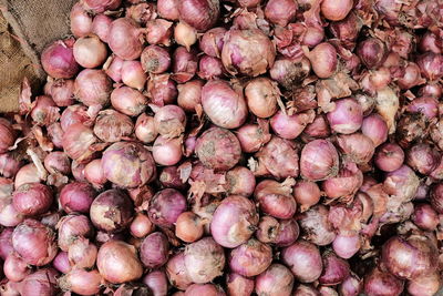 Full frame shot of onions for sale in market