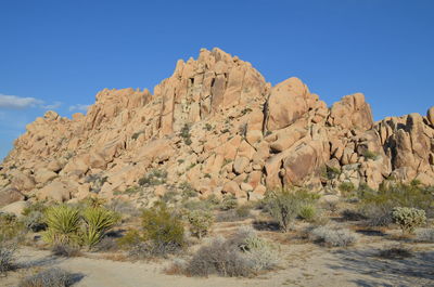 Low angle view of mountain against clear sky