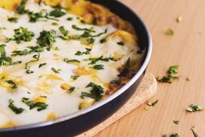 High angle view of omelets with parsley 