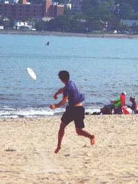 People enjoying at beach