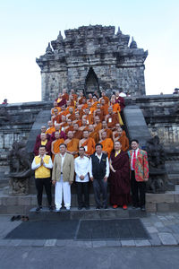 Group of people outside temple