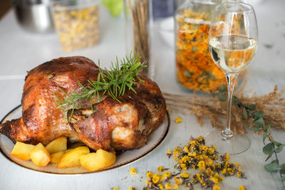 Close-up of chicken in plate on table