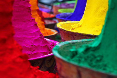 Close-up of powder paints at market stall