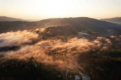 Scenic view of mountains against sky during sunset