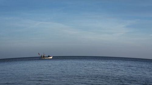 Boat sailing in sea