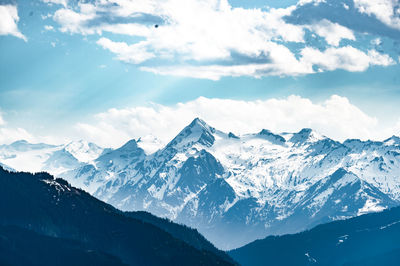 Scenic view of snowcapped mountains against sky