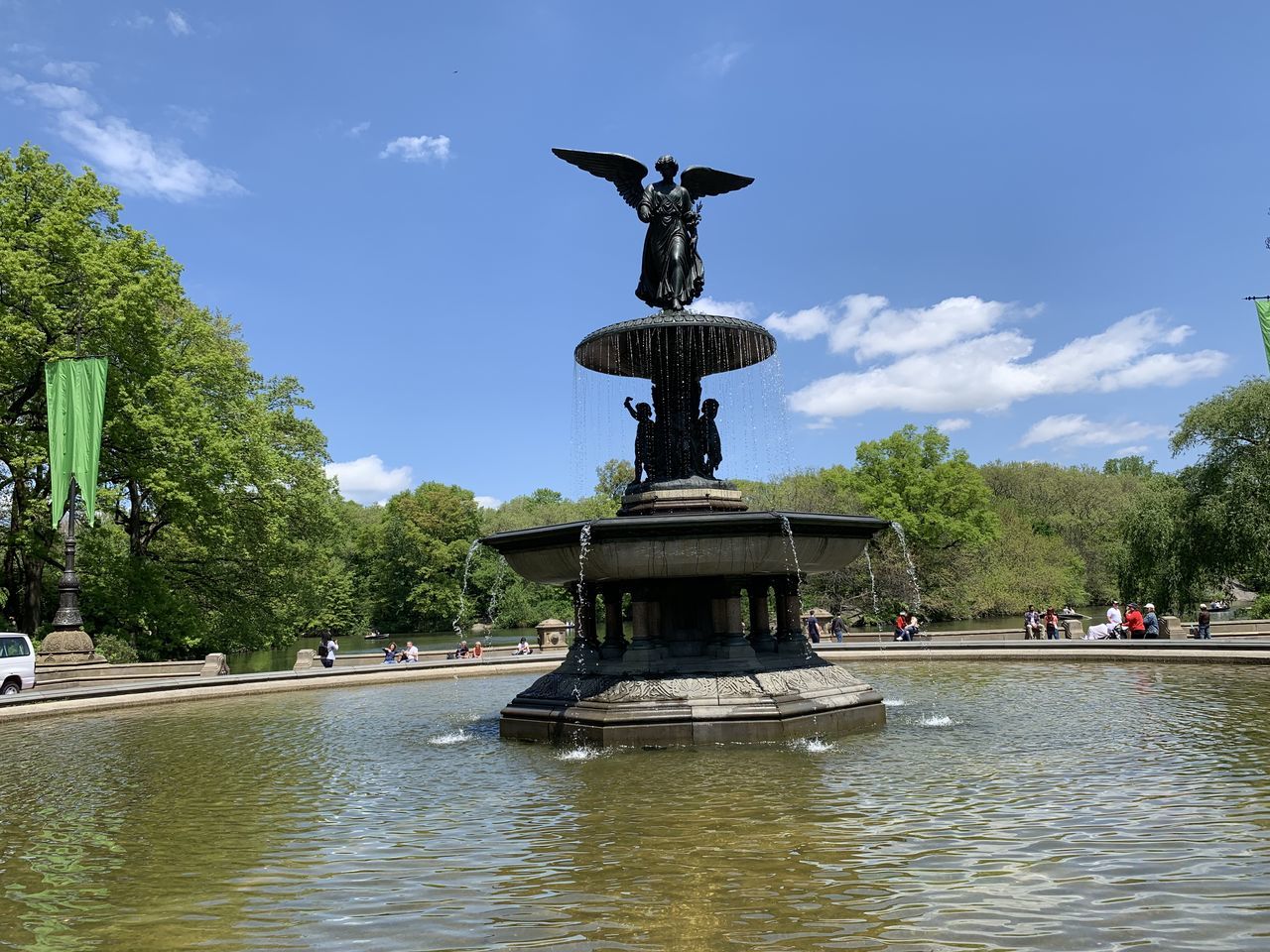 water, representation, sculpture, statue, plant, art and craft, sky, human representation, architecture, tree, nature, waterfront, day, creativity, incidental people, built structure, cloud - sky, fountain, outdoors