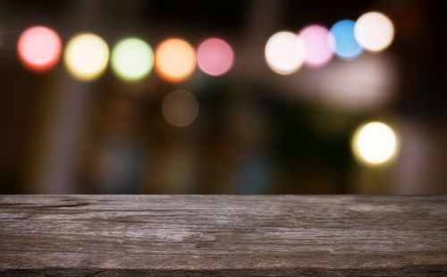 Defocused image of illuminated lights at night