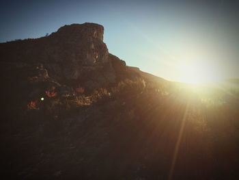 Scenic view of landscape against sky during sunset