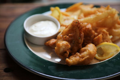 Close-up of served food in plate