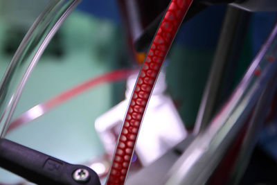 Close-up of bicycle wheel in playground