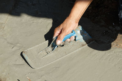 High angle view of man working at beach