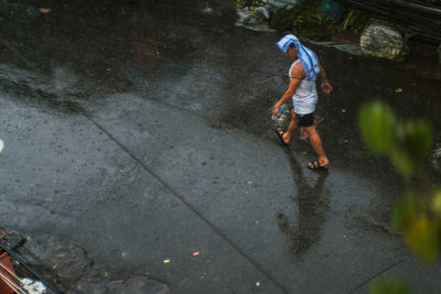 High angle view of boy in city