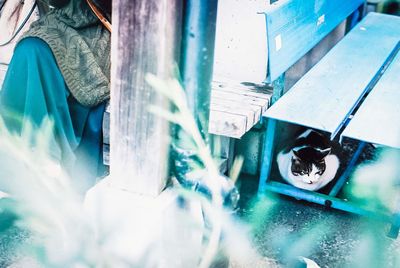 Man working in blue machine