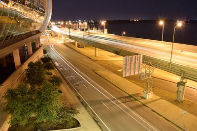 High angle view of light trails on road at night