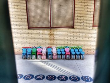 Multi colored bottles on wall