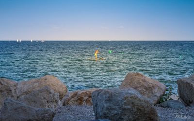 Scenic view of sea against clear sky