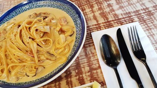 High angle view of noodles in bowl on table