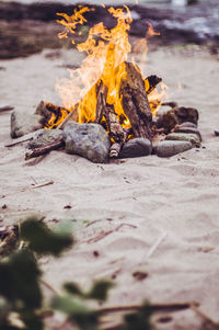 Campfire at sandy beach