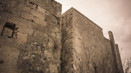 Low angle view of historic building against sky