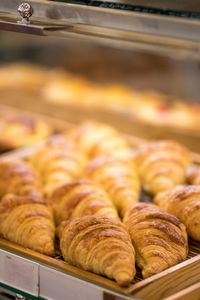 Close-up of croissant on cooling rack