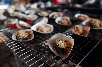Close-up of meat on barbecue grill