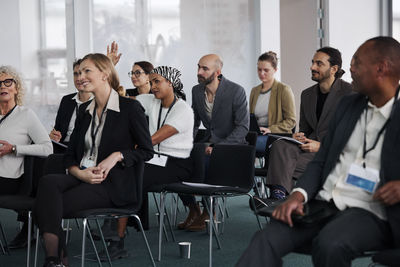 Business people sitting during business meeting