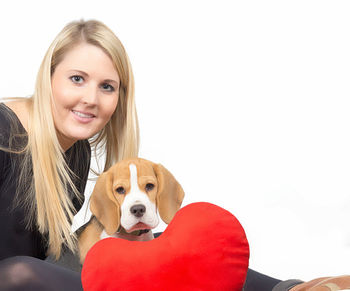 Portrait of smiling woman with dog
