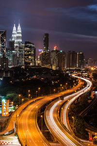 High angle view of light trails on road in city