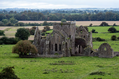 View of old ruin on field