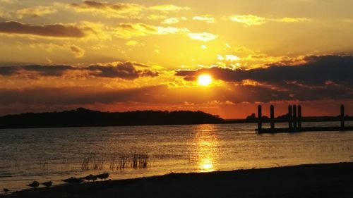 Scenic view of sea at sunset