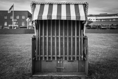 View of hooded chair on ground