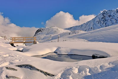 Snow covered mountain against sky