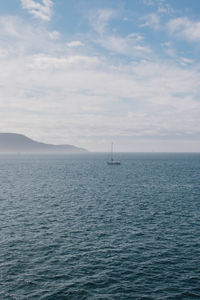 Single lone sailboat in the puget sound pnw northwest