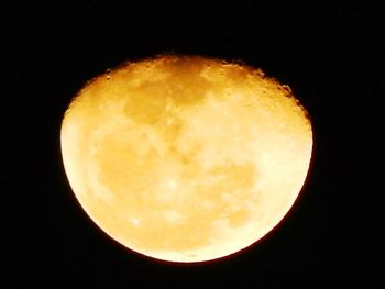 Moon over black background