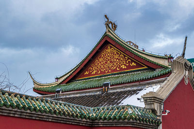 Low angle view of traditional building against sky