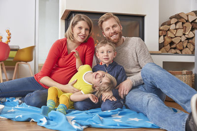 Portrait of happy family at home