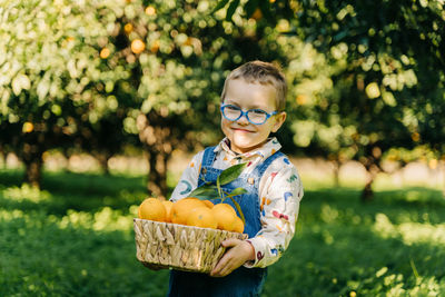 Portrait of cute girl holding food