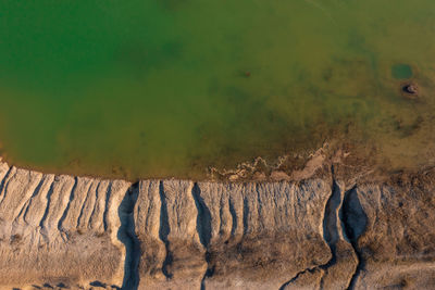 View of rock formation in sea