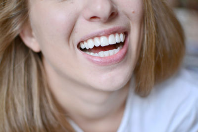 Midsection of happy woman