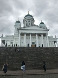 Group of people in front of building