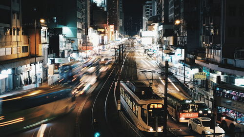 High angle view of light trails on road in city