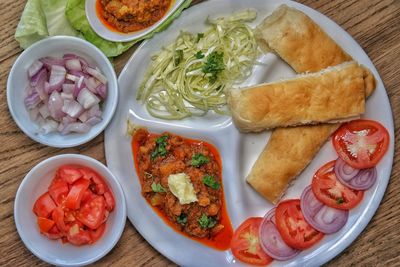 High angle view of breakfast served on table