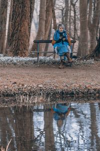 Full length of a boy in water