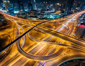 High angle view of light trails on elevated road