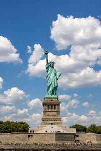 Low angle view of statue against sky