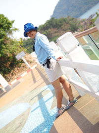 Rear view of man in swimming pool