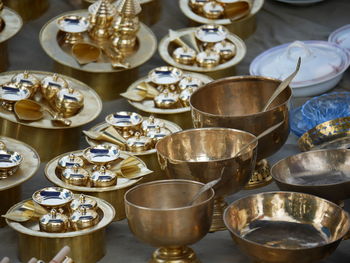 Close-up of wine glasses on table